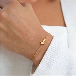 Gold cross bracelet